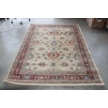 Approx. 7'8" x 5'2" patterned rug