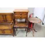 A stained pine side table fitted two drawers and a
