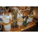 A large glass vase, pottery jug, stoneware jars et
