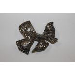 A 1920's silver and marcasite bow brooch, 14.6gms