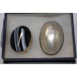 A Victorian silver banded and agate brooch; and a