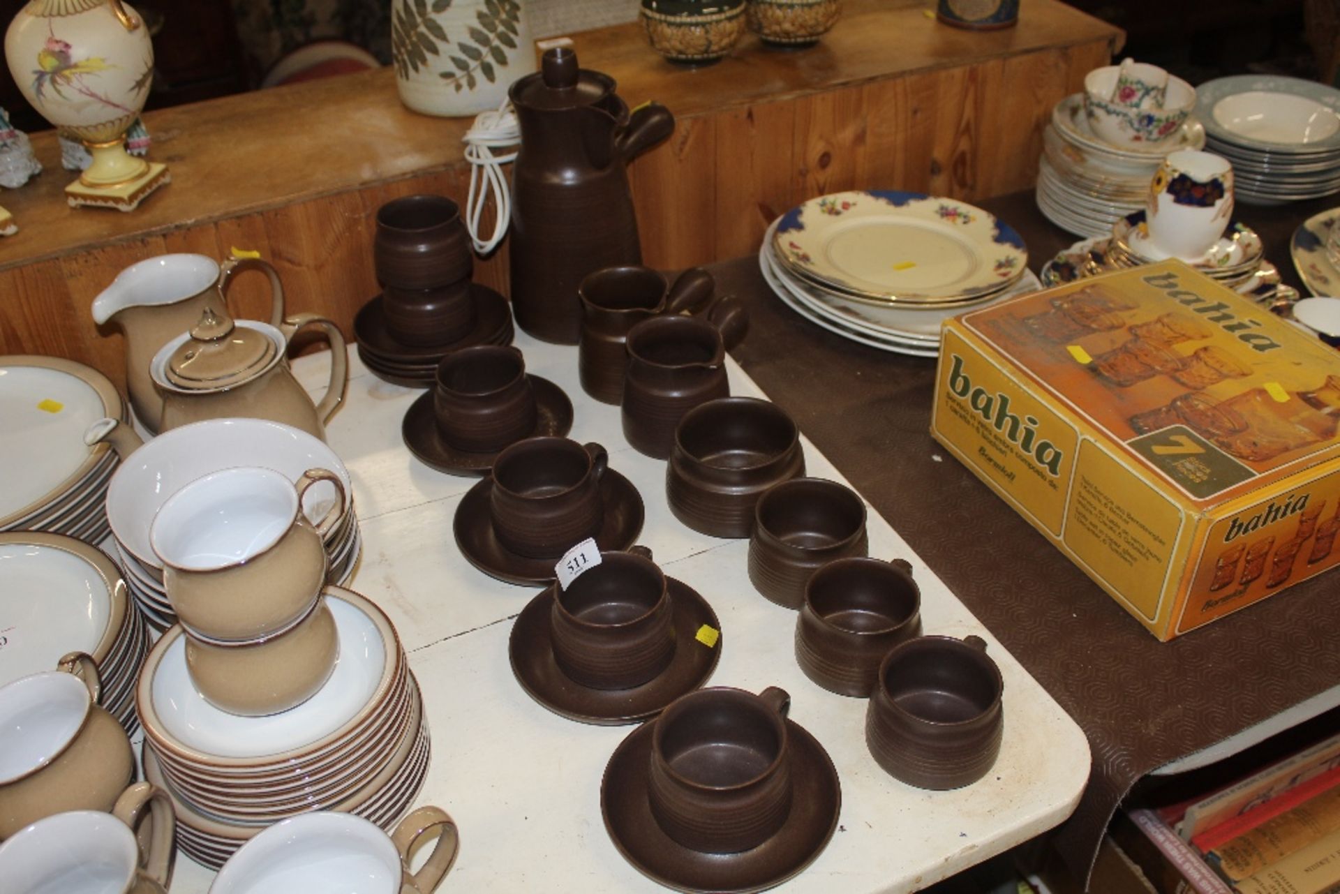 A quantity of brown glazed teaware