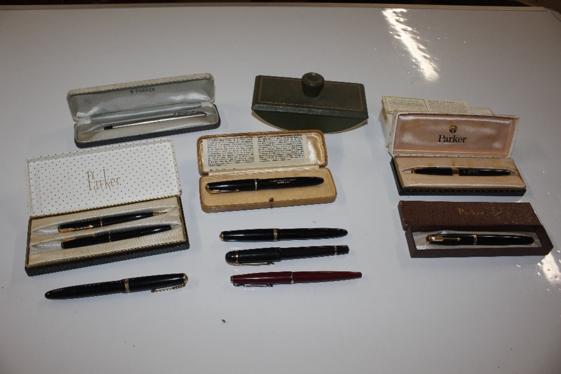 A box to include vintage Parker and other fountain