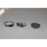 A marcasite set bow ring; an Art Deco marcasite ri