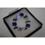 A boxed silver plated and enamel decorated bracelet