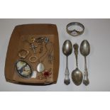 Three silver plated spoons and a small quantity of