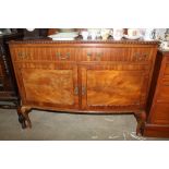 A sideboard fitted two drawers