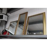 Four various wall mirrors
