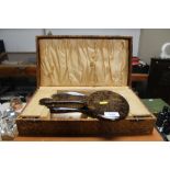 A cased faux tortoise shell dressing table set