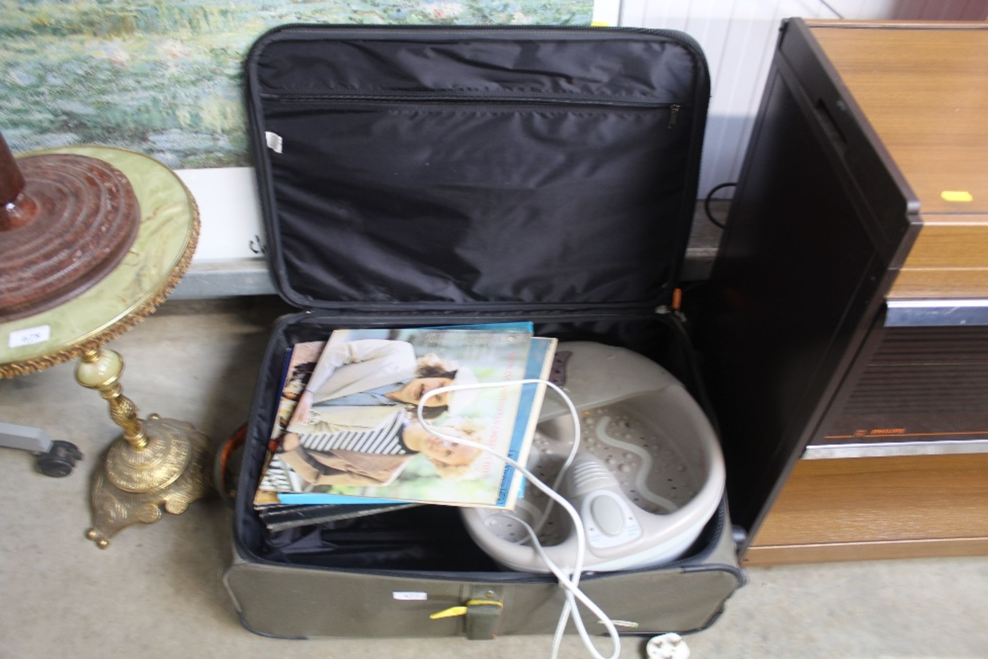 A case containing foot bath and various records