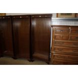 A reproduction mahogany open fronted bookcase