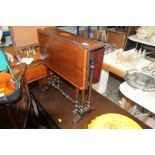 An Edwardian mahogany and inlaid Sutherland table