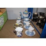 An Oriental tea set together with a blue and white