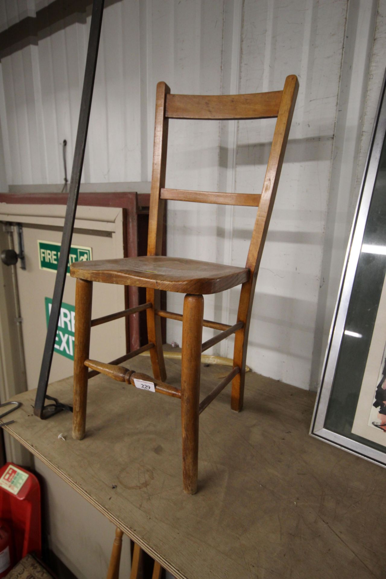 A child's elm seated chair