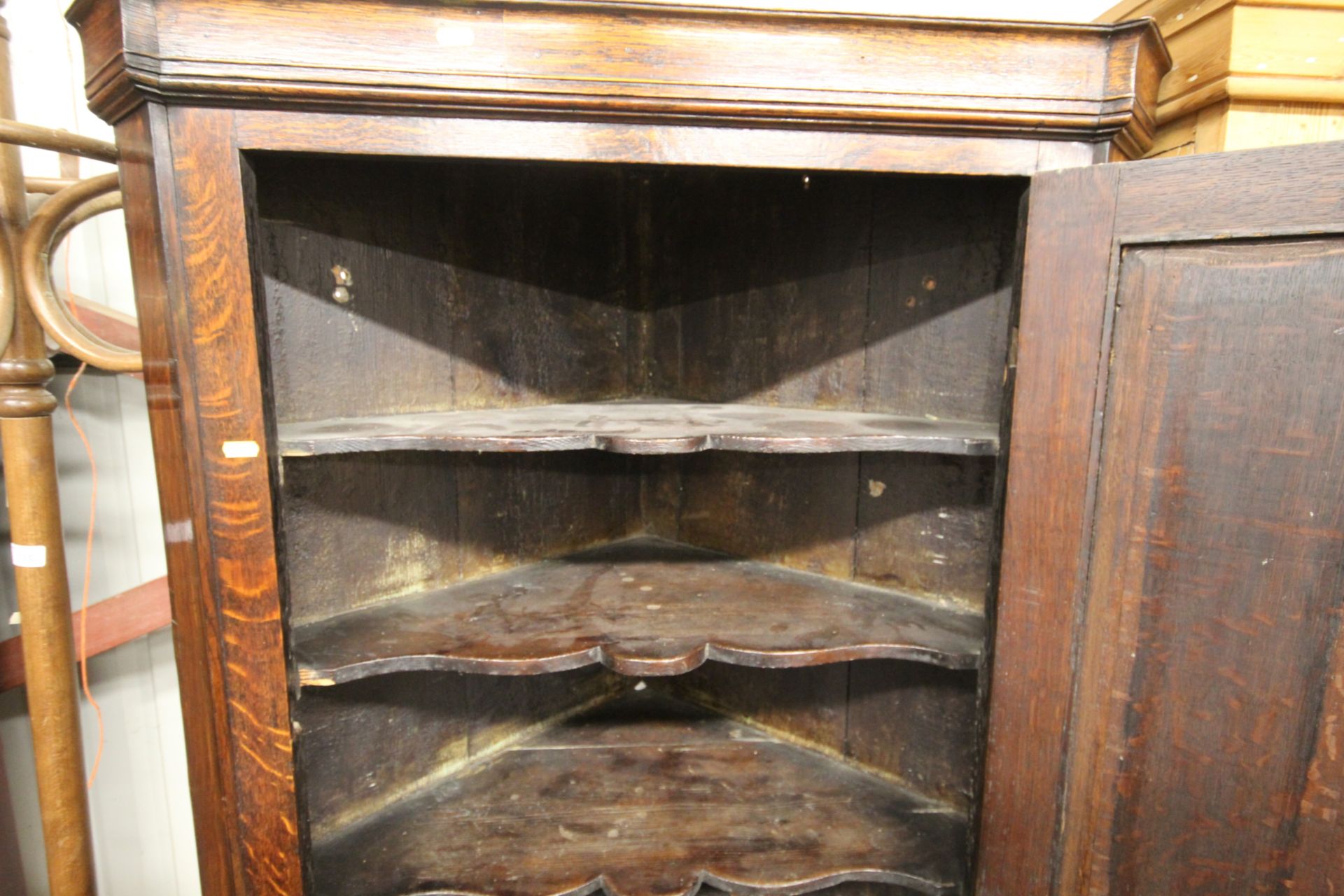 A Georgian oak corner cupboard on stand, the inter - Image 2 of 4