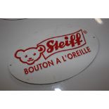 Four Steiff bear signs