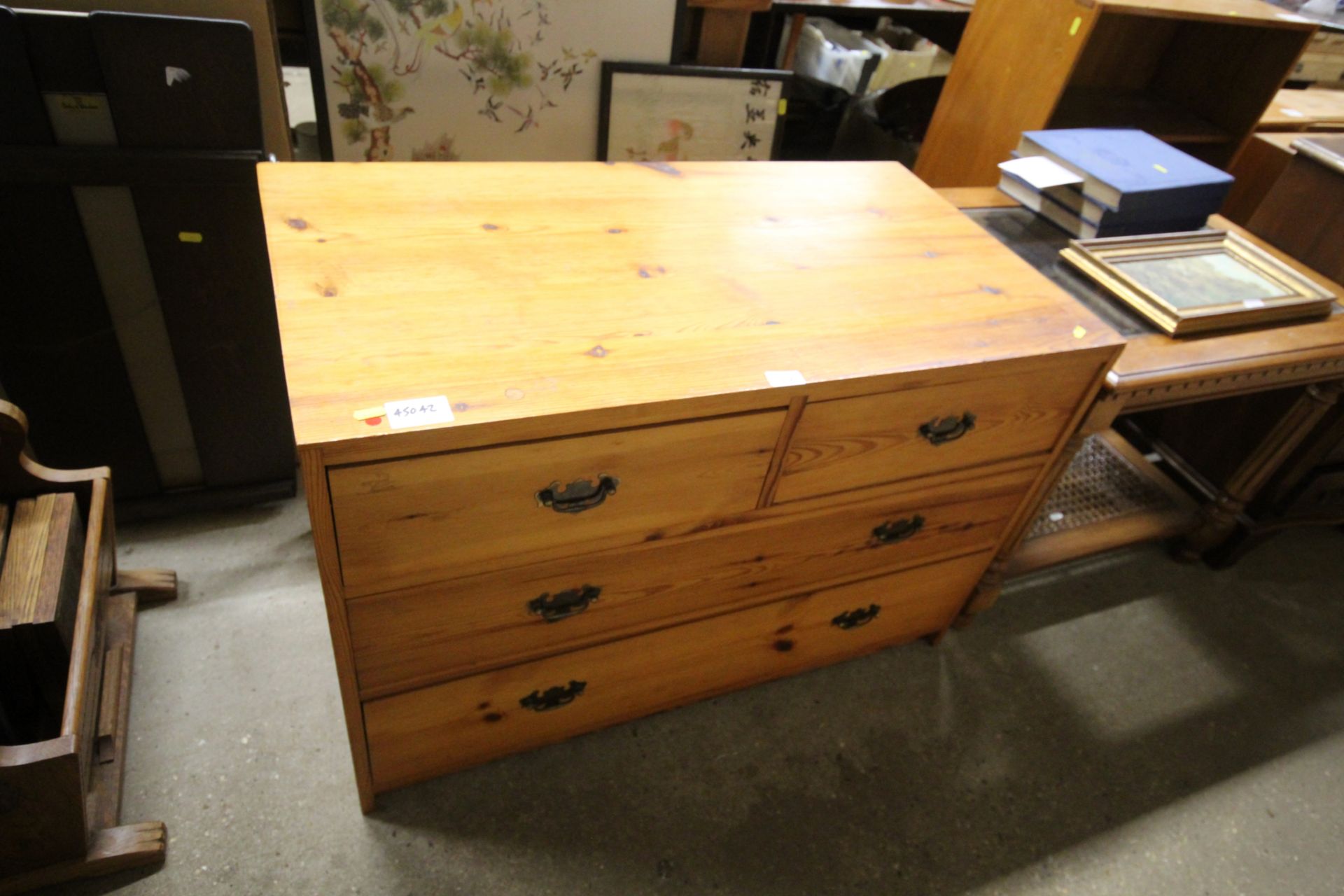 A pine chest fitted two short over two long drawer