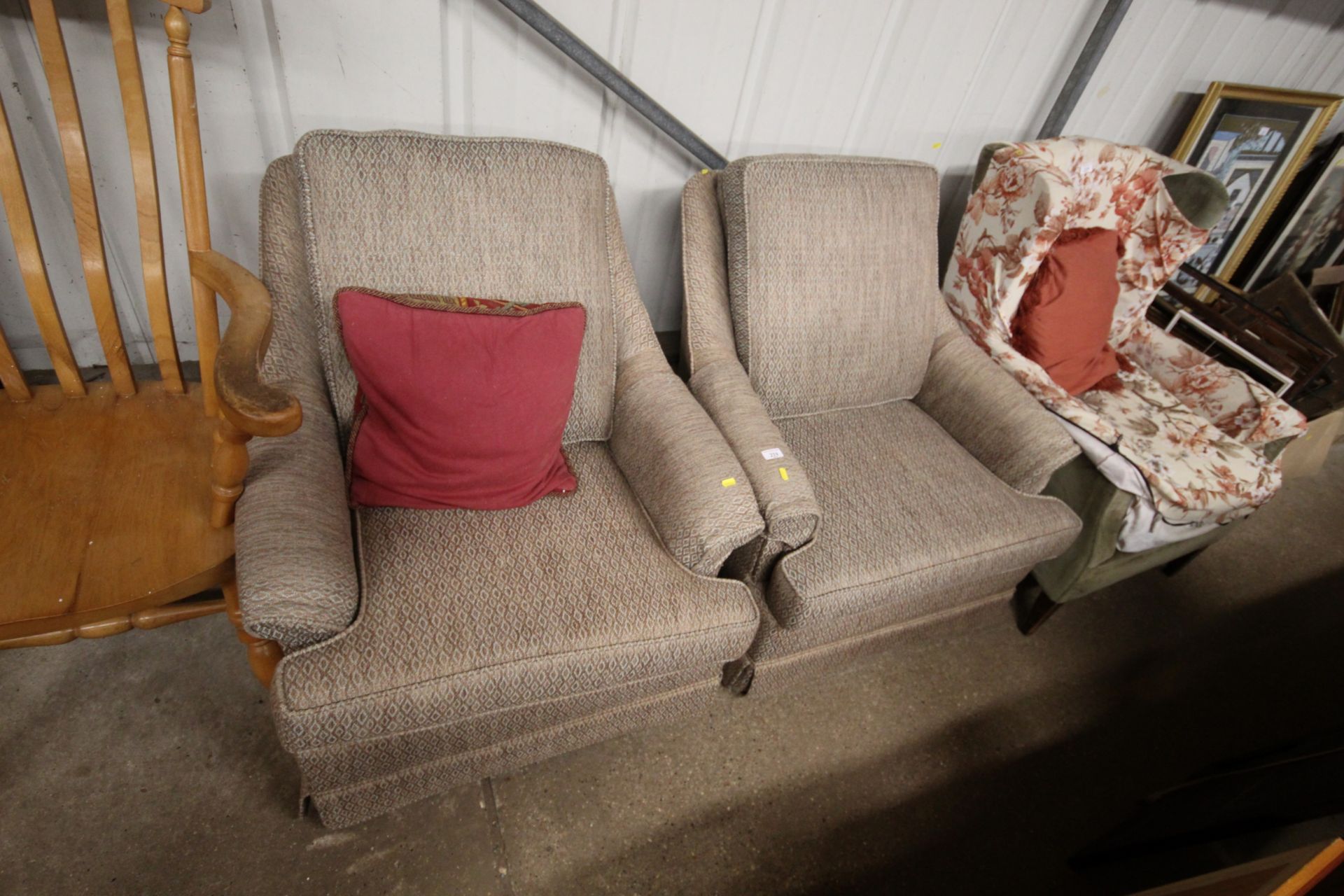 A pair of upholstered armchairs