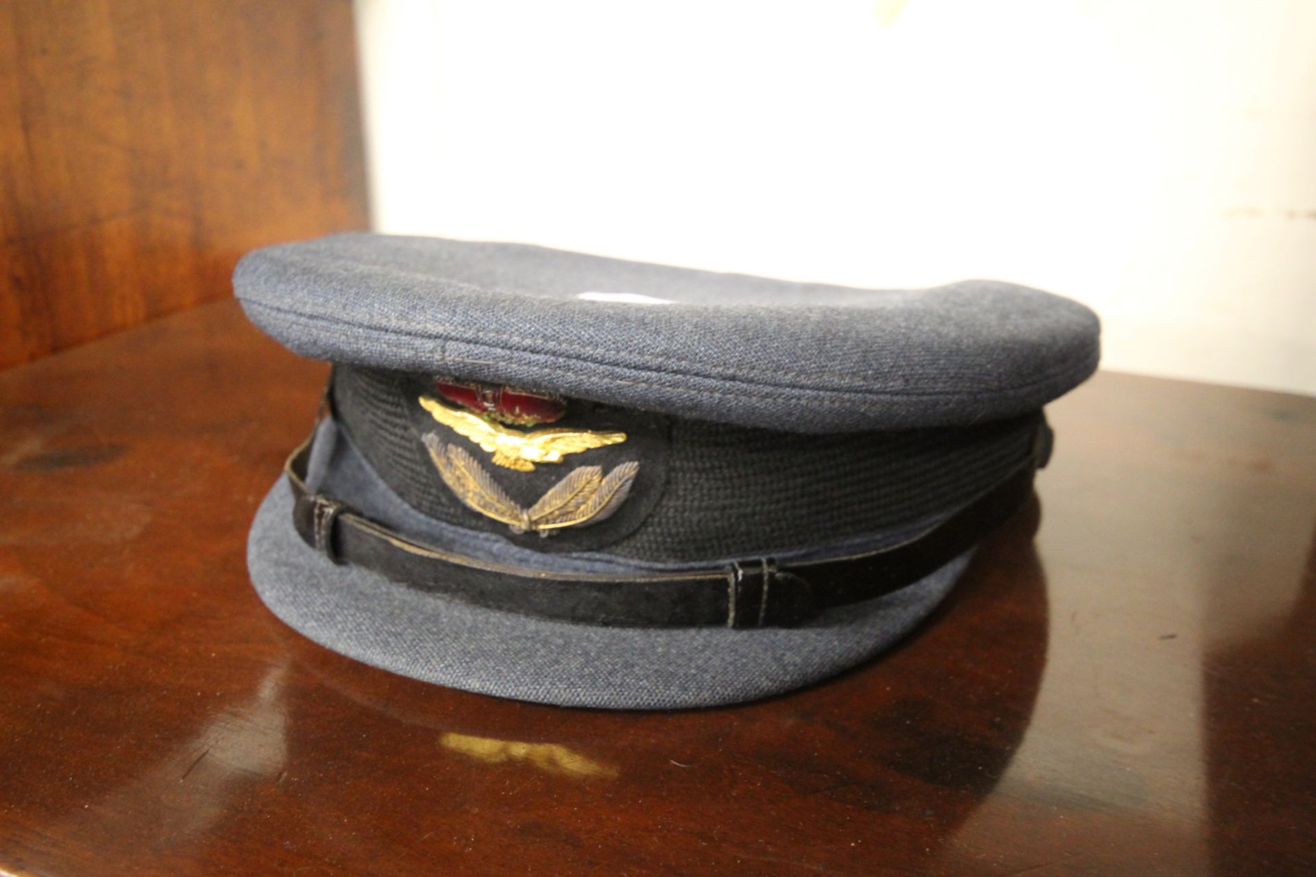 An RAF cap by Moss Bros.