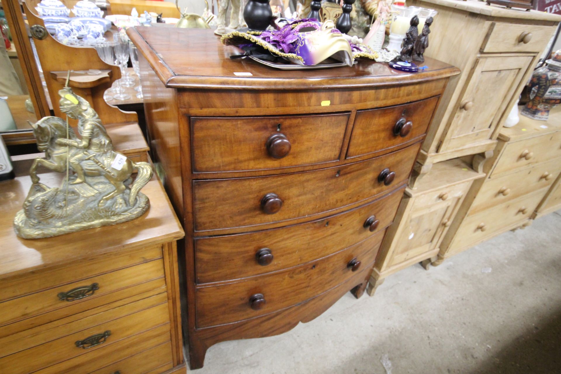 A Victorian bow front chest fitted two short over