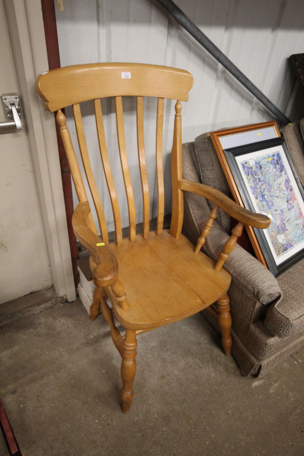 A beech slat back elbow chair