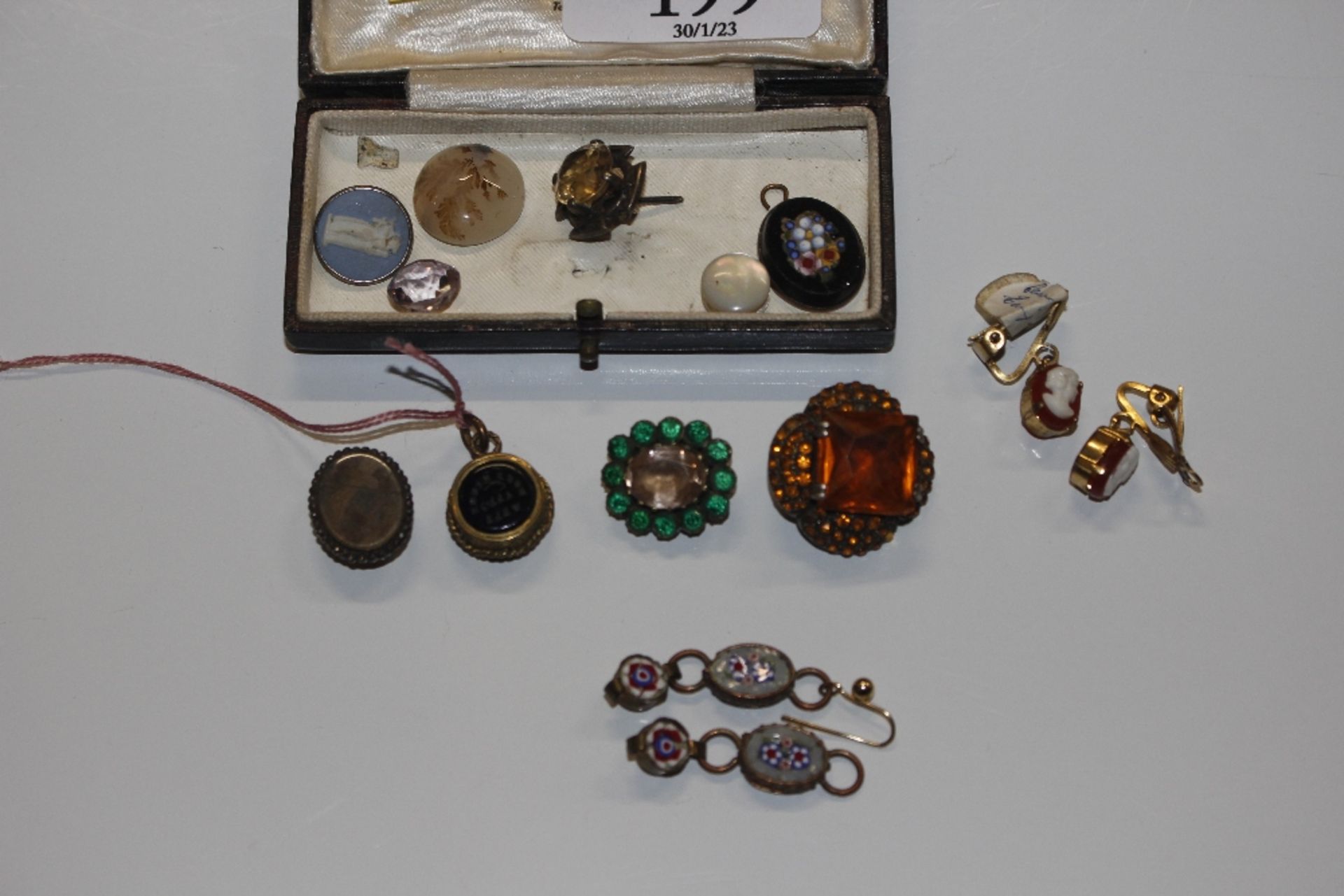 A box containing a pair of micro mosaic ear-rings;