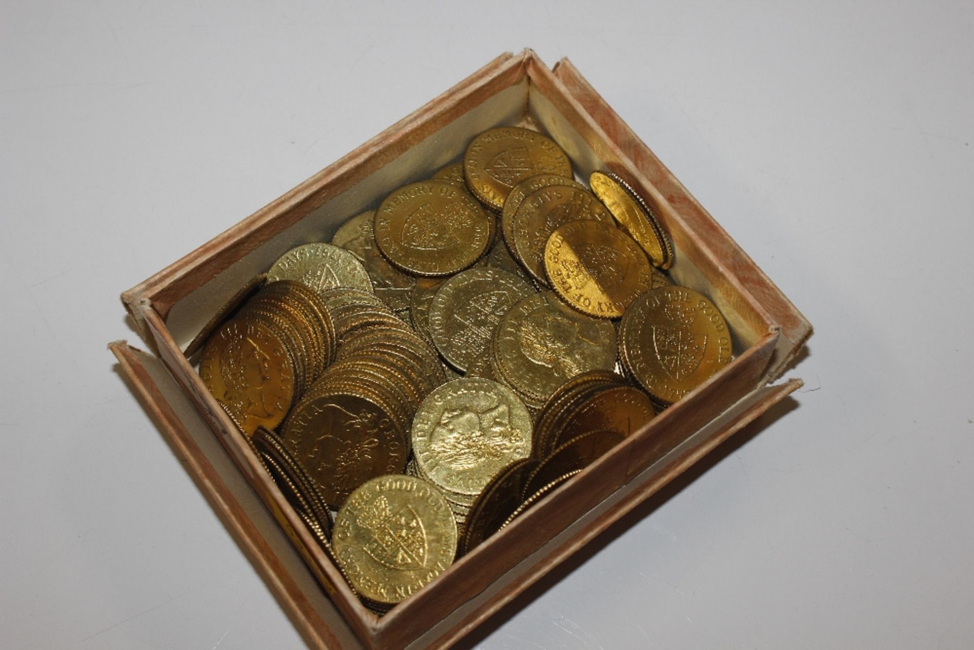 A box of Spade Guinea card counters