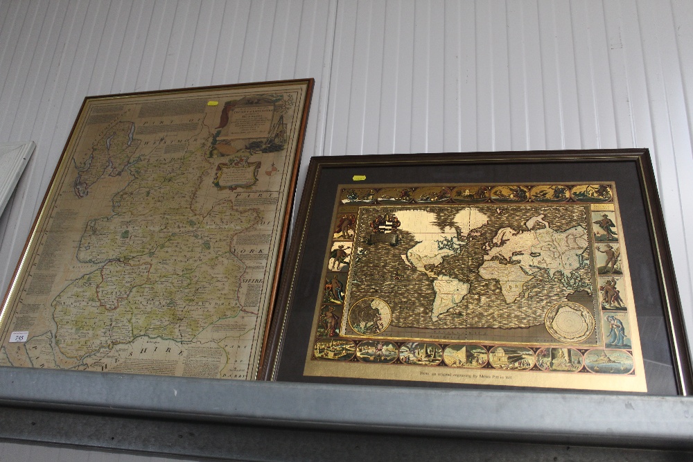 A framed and glazed gilded map and another framed