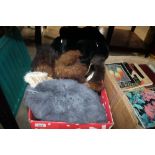 A box of faux fur including coats and jackets