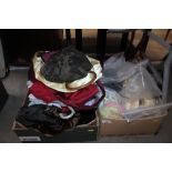 Two boxes containing wigs; bags and clothing