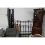 A brass and iron style double bed frame