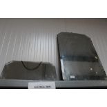 Two frameless bevelled edge wall mirrors