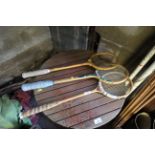 Three vintage wooden squash racquets