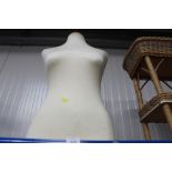 A fabric mannequin torso