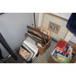 Two boxes containing various pictures and prints