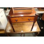 A Victorian mahogany side table fitted single draw