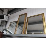 Four various wall mirrors