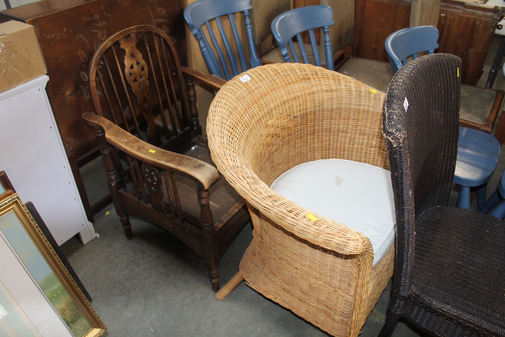 A wicker armchair and a stick and wheelback reclin