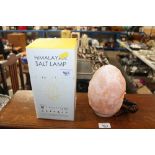 A Himalayan salt lamp with original box