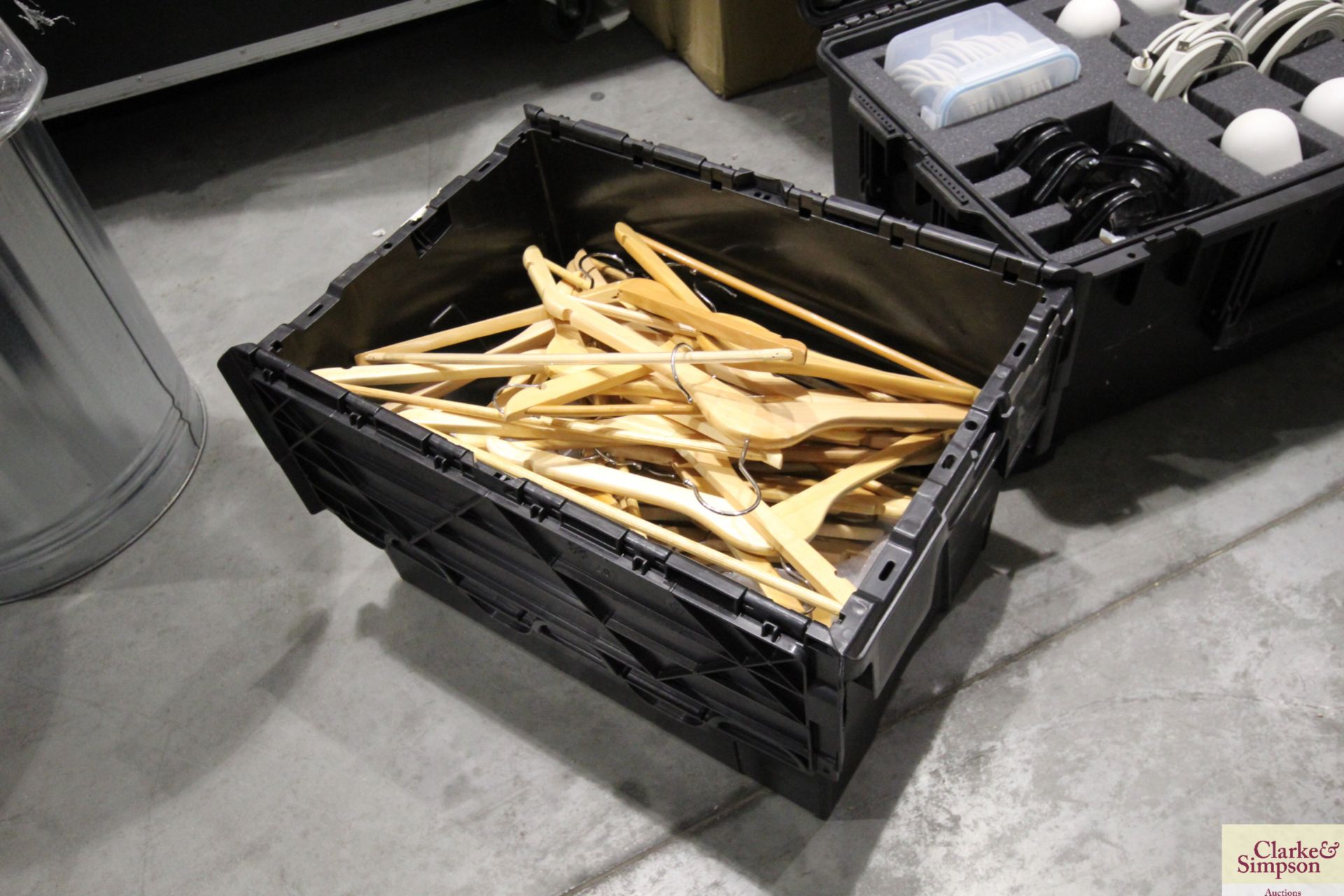 Box containing a quantity of wooden coat hangers. V