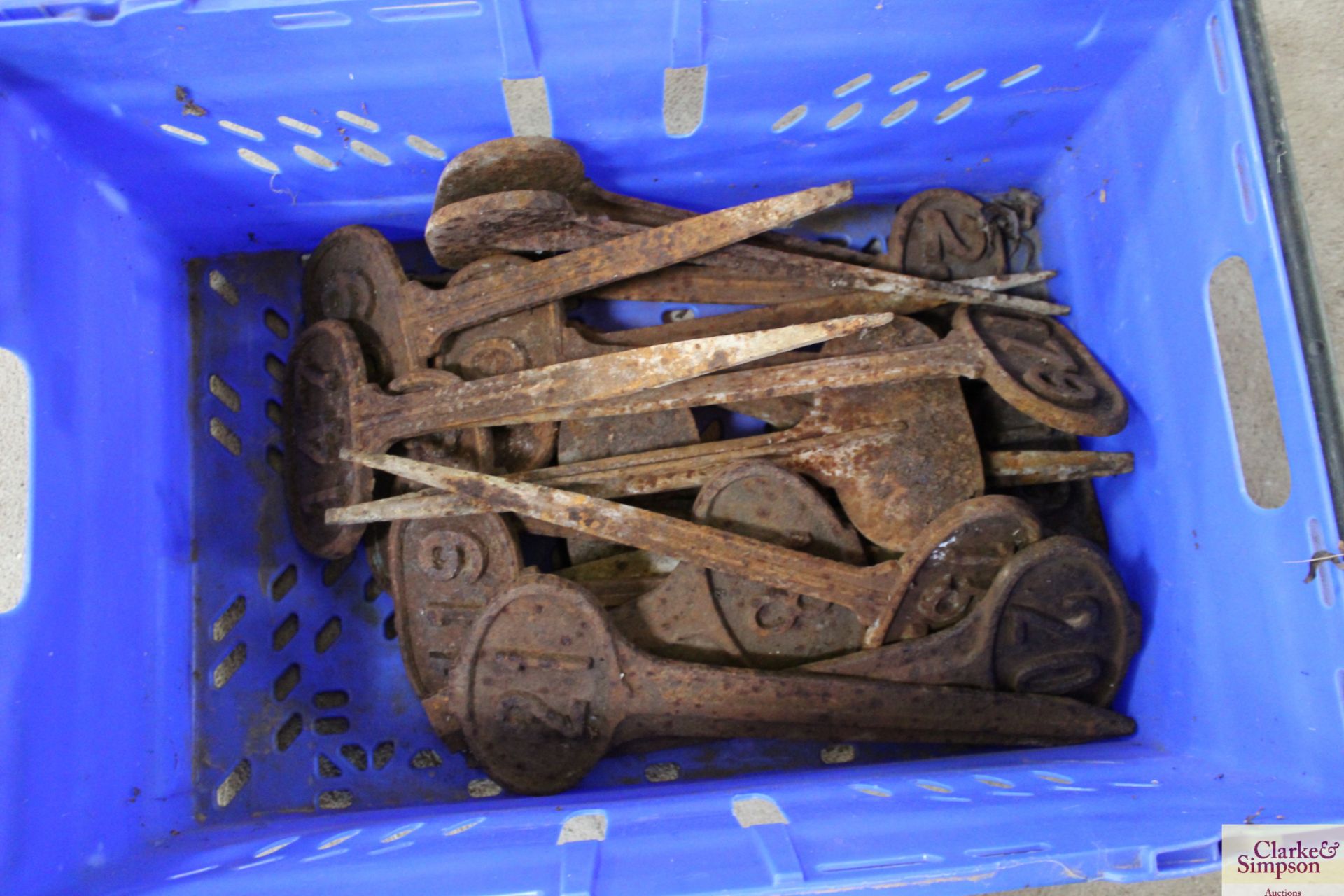 A box containing various numbered cast iron marker - Image 2 of 2