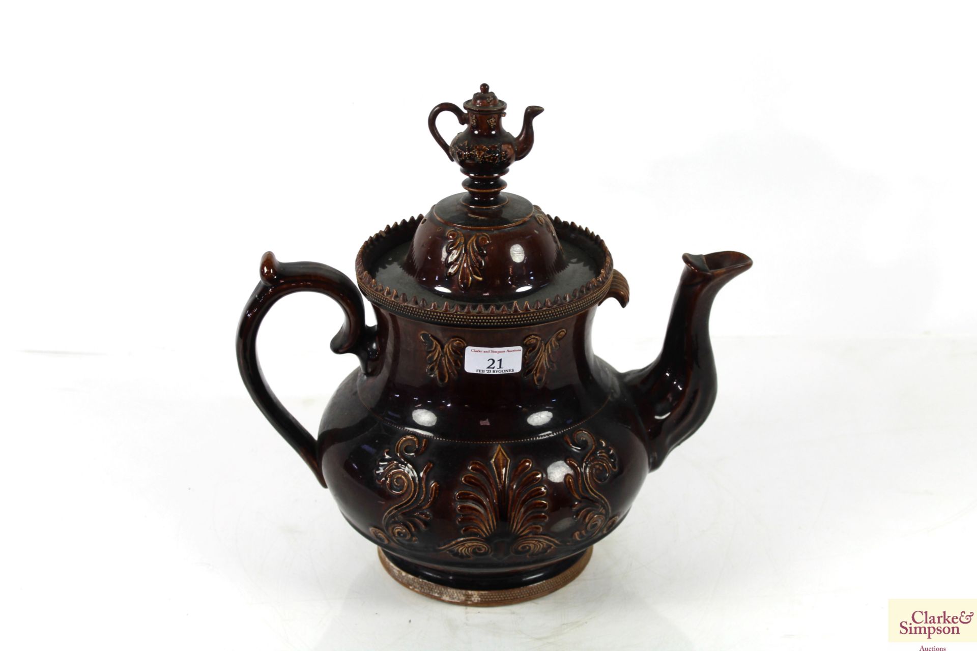 A large ceramic bargeware teapot