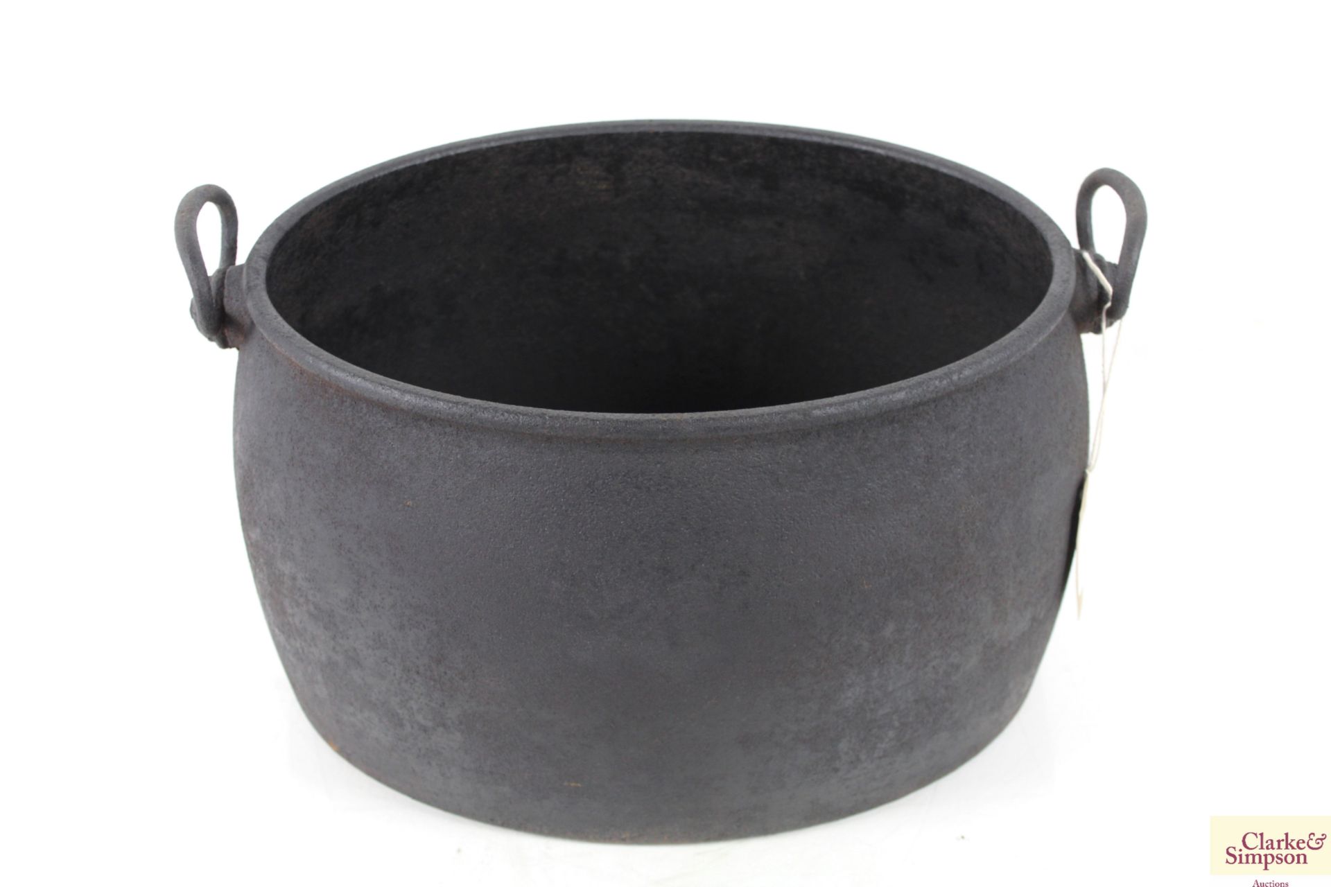 A cast iron travellers cooking cauldron