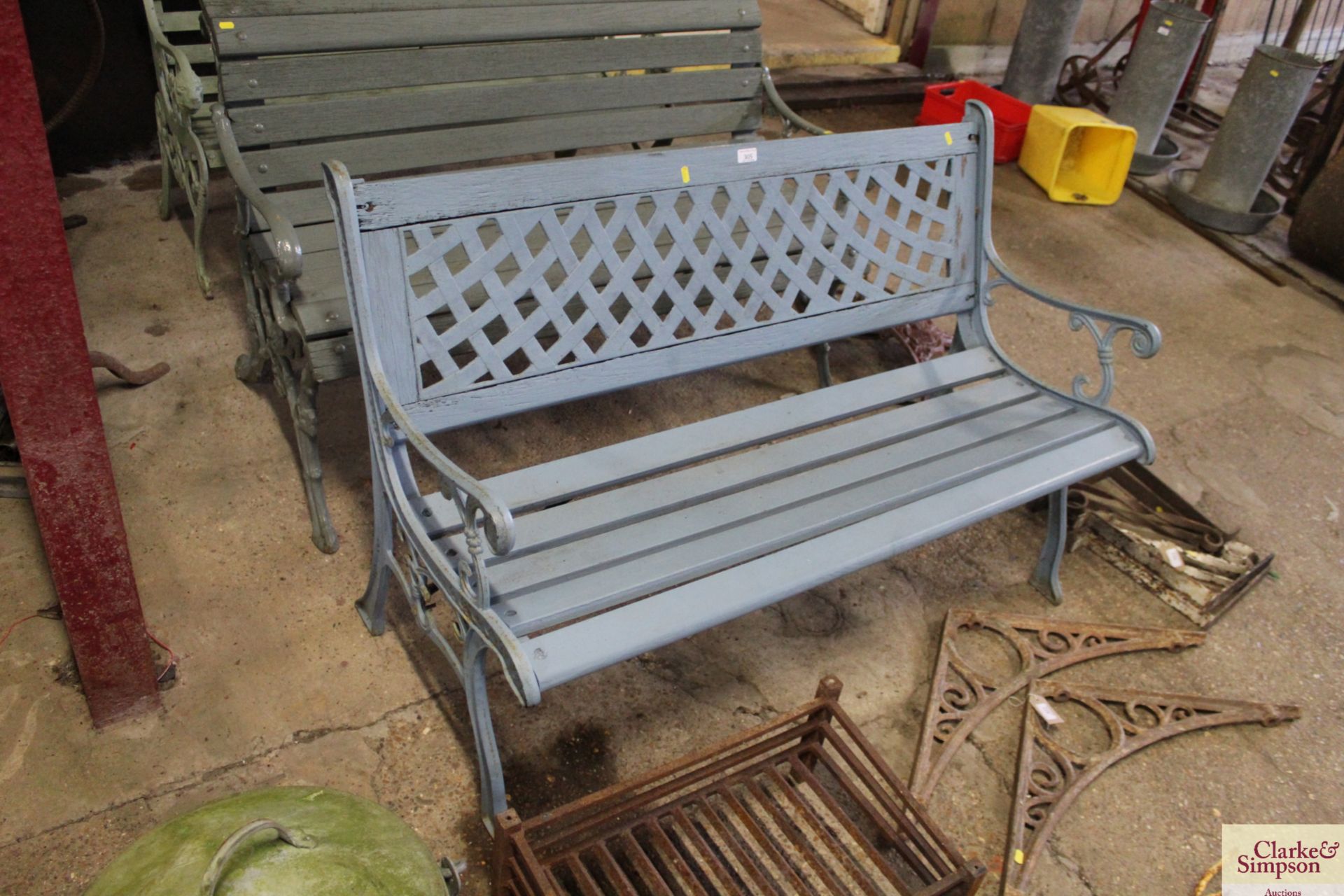 A cast iron and wooden garden bench - Image 2 of 3