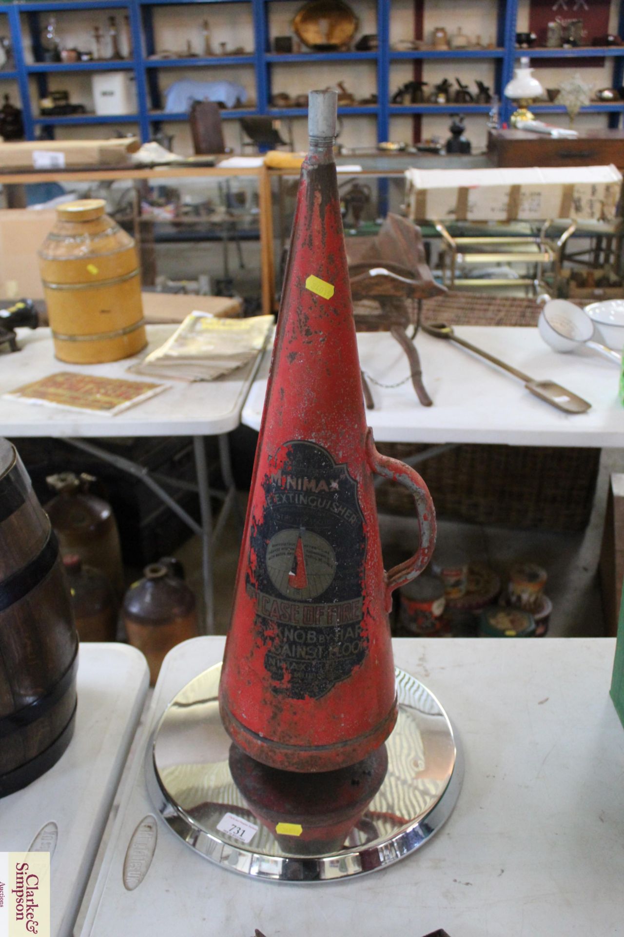 A fire extinguisher with base for conversion to a