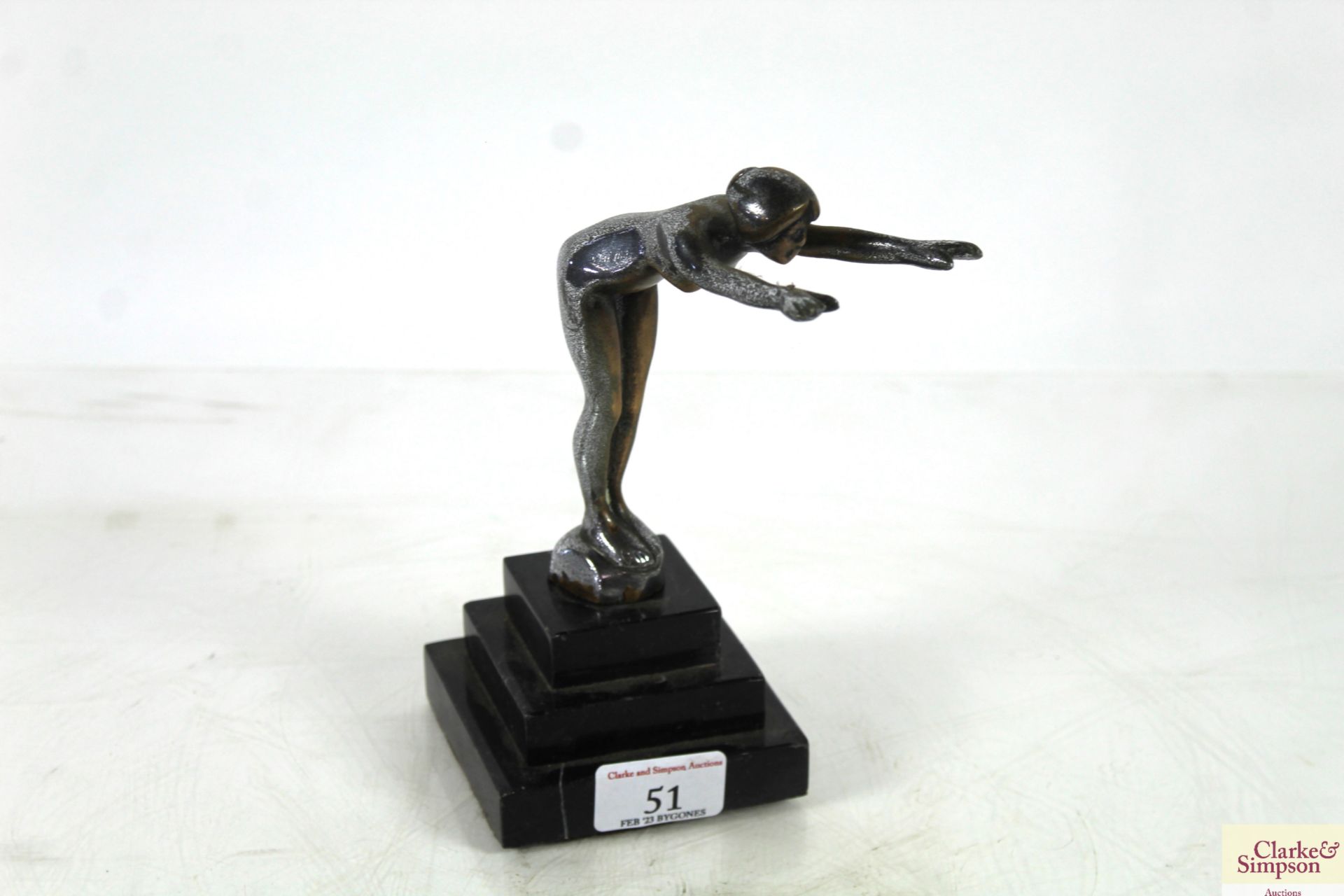 A silvered bronze 1920's car mascot on plinth