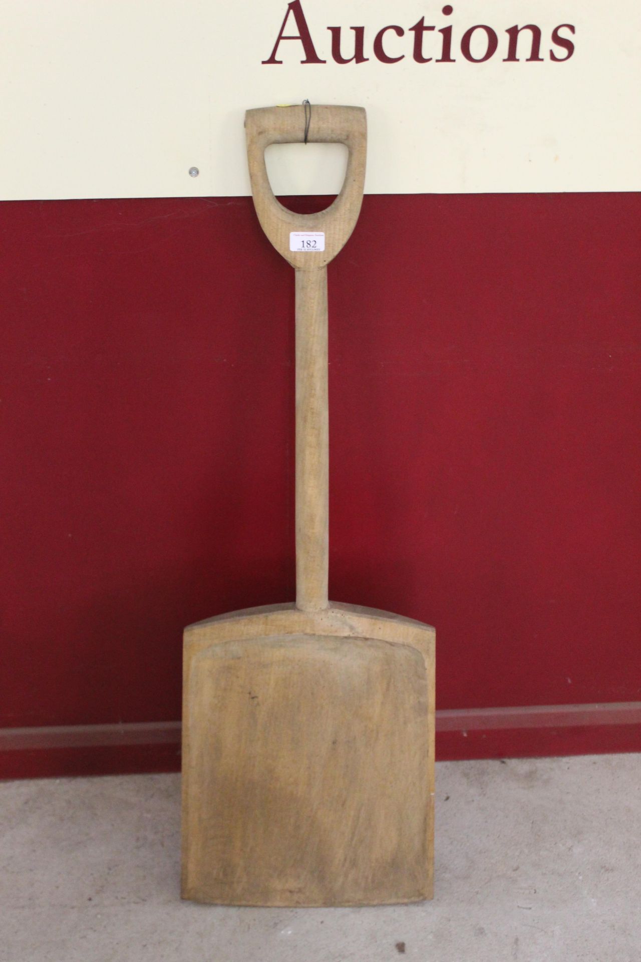 A wooden malt shovel from Isaac Lord Maltings in I
