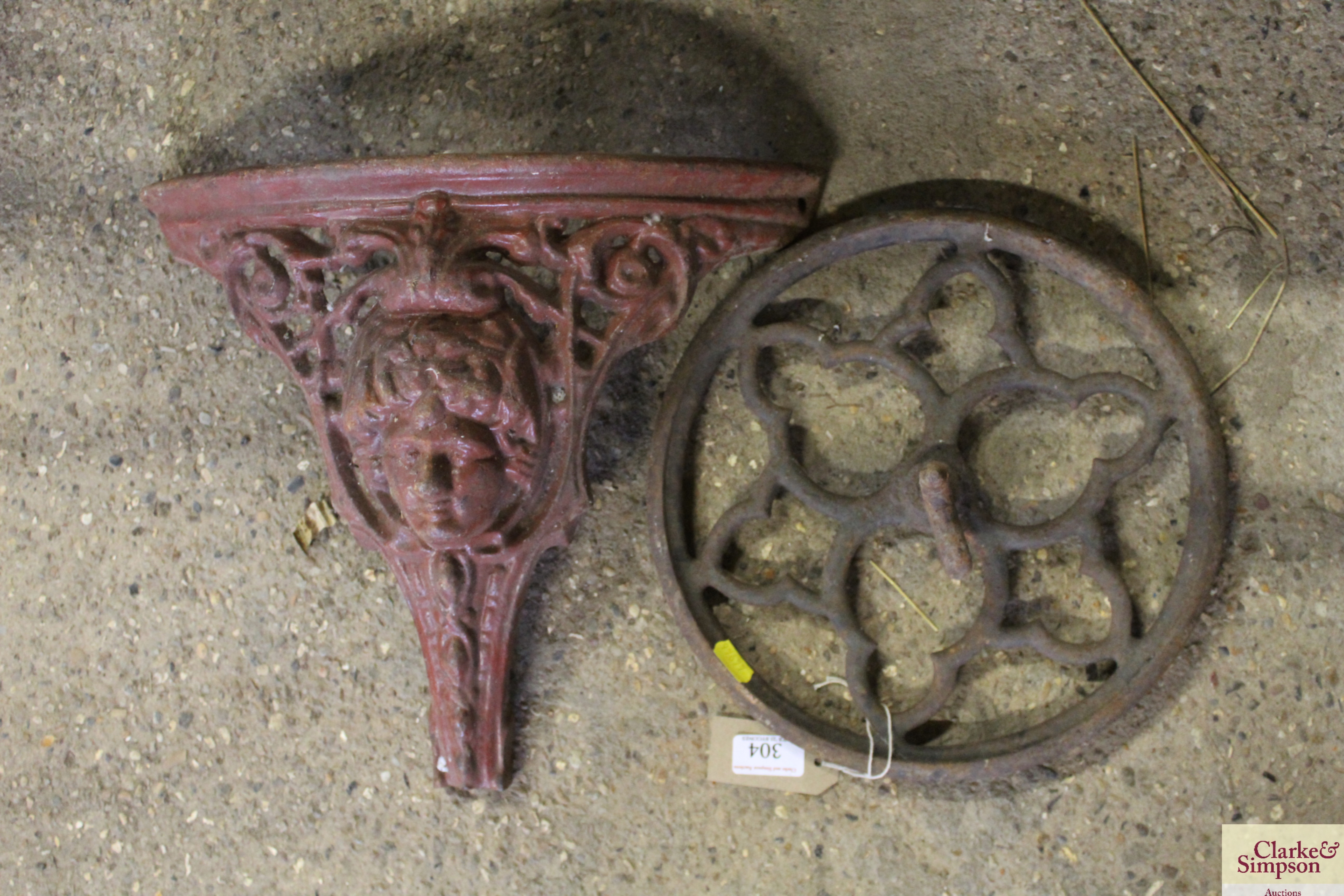 A demi-lune metal cherub decorated bracket etc. - Image 2 of 2