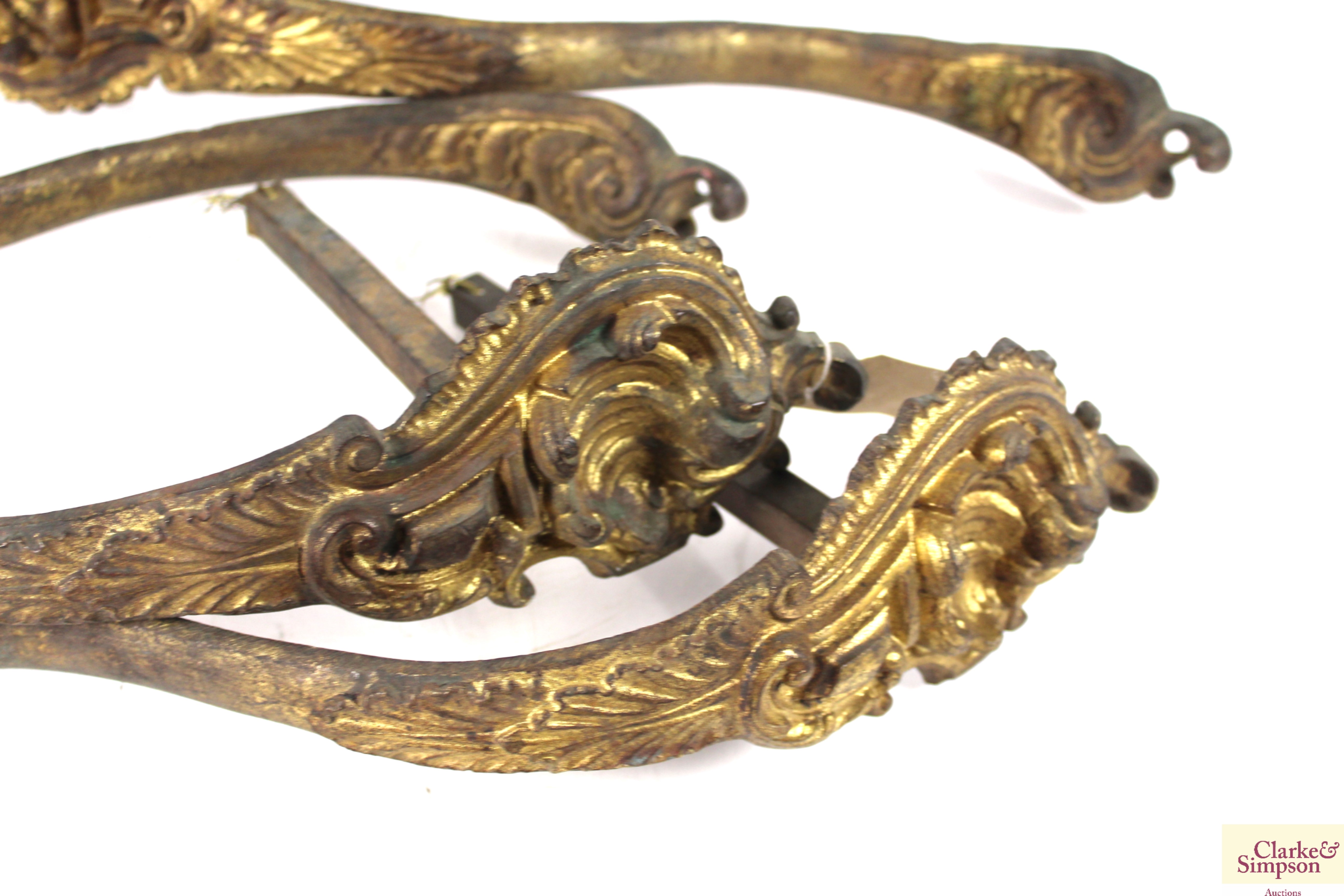 A set of four 19th Century gilded brass curtain ti - Image 4 of 5