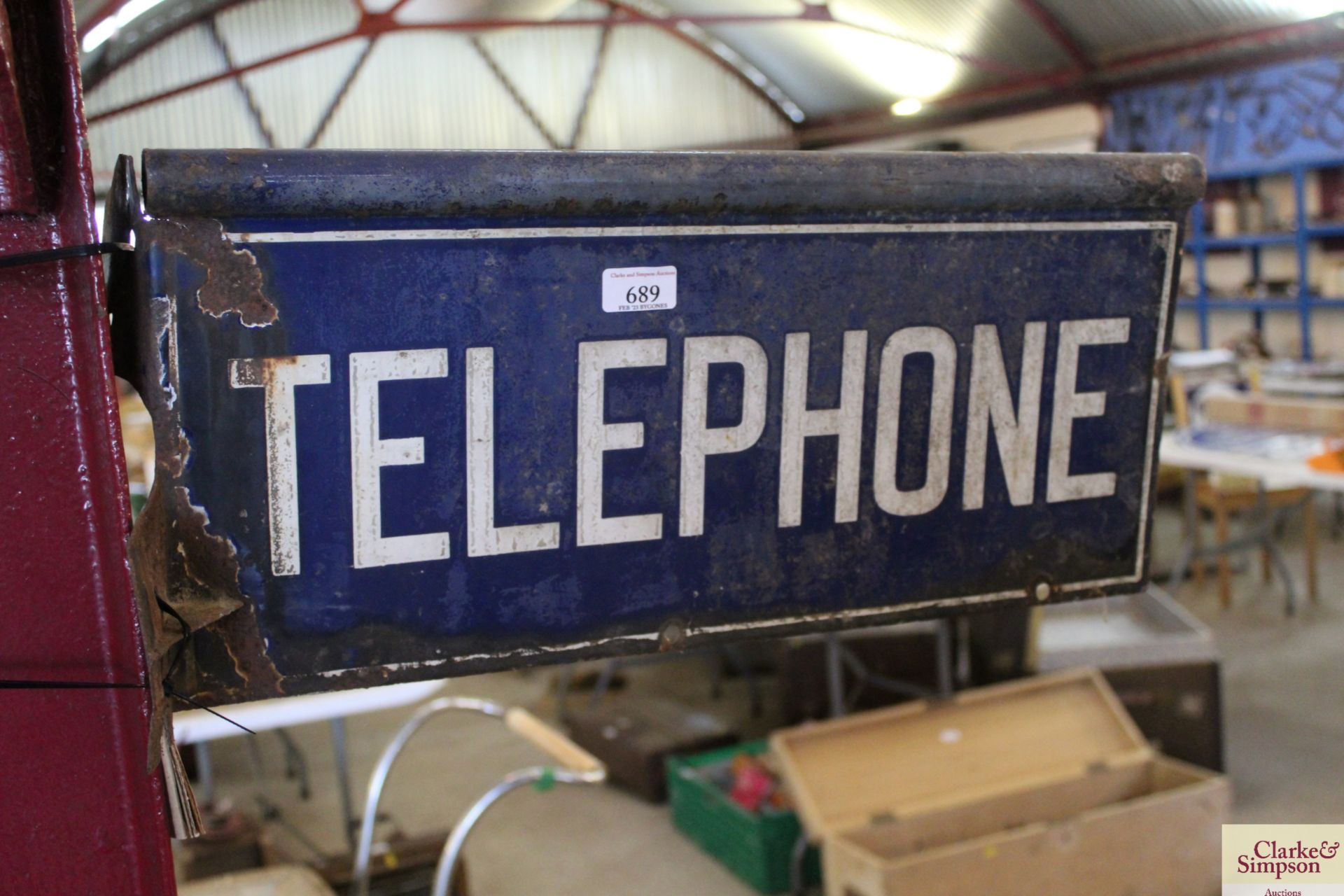 A vintage double sided enamel telephone sign, appr